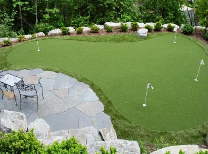 Backyard putting green with flag