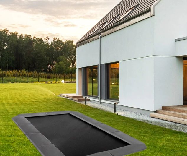 Modern Marin County backyard with inground trampoline